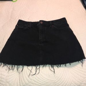 Black jean skirt with frayed hems